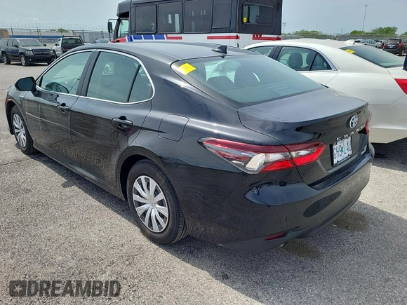 2021 Toyota Camry Hybrid LE with VIN 4T1C31AKXMU554621, listed as a IAAI auction lot 42190615 with 133,190 mi miles. Bid and sale history available at carsss.com. Image 1.