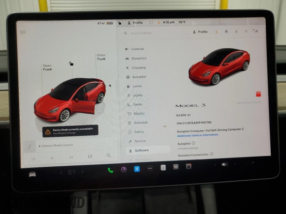 2023 Tesla Model 3 with VIN 5YJ3E1EA6PF455789, listed as a Copart auction lot 54715665 with 64,658 mi miles and Salvage Title. Bid and sale history available at DreamBid. Image 9.