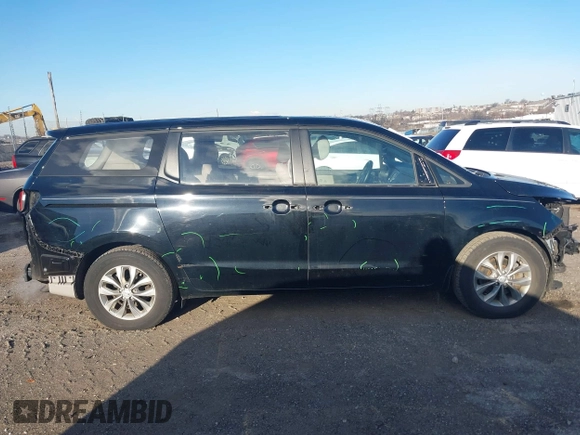 2019 Kia Sedona L with VIN KNDMA5C11K6539162, listed as a IAAI auction lot 41150477 with 76,847 mi miles. Bid and sale history available at carsss.com. Image 13.