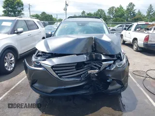 2019 Mazda CX-9 Touring with VIN JM3TCACY6K0334085, listed as a IAAI auction lot 42391595 with 113,723 mi miles and . Bid and sale history available at DreamBid. Image 6.