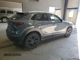2022 Mazda CX-30 S Carbon Edition с VIN 3MVDMBCL7NM429131, выставлен на аукционе Copart как лот 42421695 с пробегом 21 825 миль миль и Списание • Salvage title. История ставок и продаж доступна на DreamBid. Изображение 3.