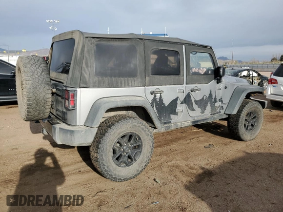 2015 Jeep Wrangler Unlimited Willys Wheeler with VIN 1C4BJWDG7FL690952, listed as a Copart auction lot 51493715 with 45,497 mi miles and Salvage Title. Bid and sale history available at DreamBid. Image 3.
