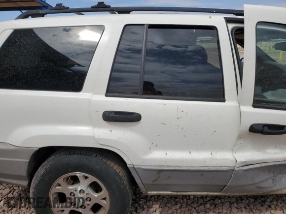 2000 Jeep Grand Cherokee Laredo with VIN 1J4G248S4YC222194, listed as a Copart auction lot 53809825 with Not provided miles and Salvage title. Bid and sale history available at DreamBid. Image 11.