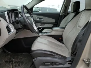 2012 Chevrolet Equinox LTZ z VIN 2GNFLGEK7C6185557, wystawiony jako Copart lot #60963655 z przebiegiem 162 795 mil mil oraz Czysty tytuł • Clean title. Historia ofert i sprzedaży dostępna na DreamBid. Obrazek 7.
