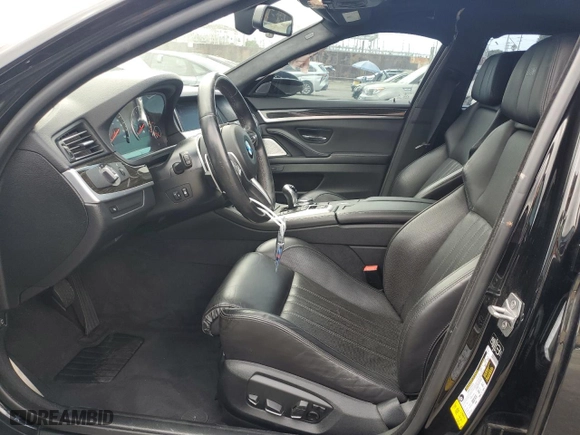 2015 BMW M5 with VIN WBSFV9C56FD594465, listed as a Copart auction lot 72085944 with 76,313 mi miles and Salvage Title. Bid and sale history available at carsss.com. Image 7.