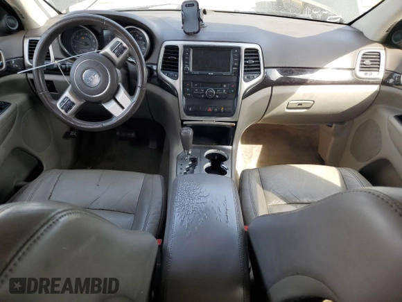 2011 Jeep Grand Cherokee Laredo with VIN 1J4RR4GG2BC636423, listed as a Copart auction lot 51169135 with 143,058 mi miles and Salvage Title. Bid and sale history available at DreamBid. Image 8.