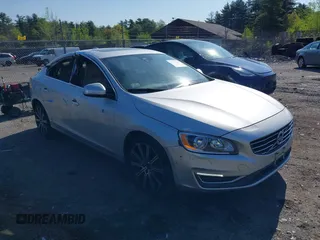 2015 Volvo S60 T5 Drive-E Premier Plus with VIN YV140MFC0F2316192, listed as a IAAI auction lot 42237991 with 130,918 mi miles and . Bid and sale history available at DreamBid. Image 1.