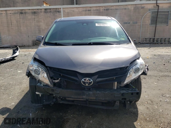 2019 Toyota Sienna L with VIN 5TDZZ3DC8KS006907, listed as a Copart auction lot 70310274 with 73,234 mi miles and Salvage Title. Bid and sale history available at carsss.com. Image 5.