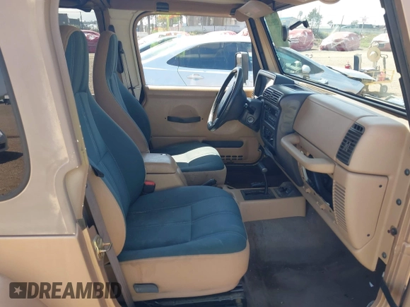 1999 Jeep Wrangler Sahara with VIN 1J4FY49S8XP462512, listed as a IAAI auction lot 42165052 with 146,135 mi miles and . Bid and sale history available at DreamBid. Image 5.