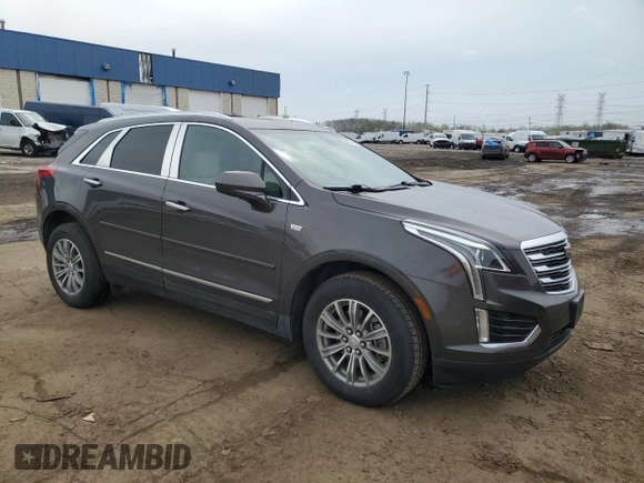 2019 Cadillac XT5 Luxury FWD with VIN 1GYKNCRSXKZ132871, listed as a Copart auction lot 54879405 with 57,325 mi miles and Salvage title. Bid and sale history available at DreamBid. Image 4.