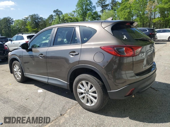 2016 Mazda CX-5 Sport with VIN JM3KE4BY4G0805179, listed as a Copart auction lot 52412745 with 85,928 mi miles and Salvage Title. Bid and sale history available at carsss.com. Image 2.