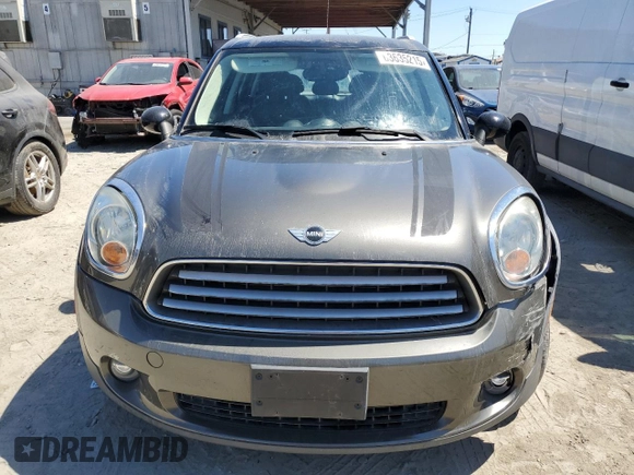 2014 MINI Countryman with VIN WMWZB3C54EWR39731, listed as a Copart auction lot 63635215 with 85,751 mi miles and Salvage title. Bid and sale history available at DreamBid. Image 5.