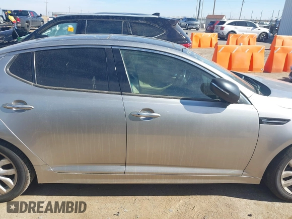 2014 Kia Optima EX z VIN 5XXGN4A74EG260054, wystawiony jako IAAI lot #41464688 z przebiegiem 40 498 mil mil oraz . Historia ofert i sprzedaży dostępna na DreamBid. Obrazek 13.