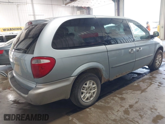 2003 Dodge Caravan Sport with VIN 2D4GP44R63R337716, listed as a IAAI auction lot 42767821 with 200,881 mi miles and . Bid and sale history available at DreamBid. Image 4.