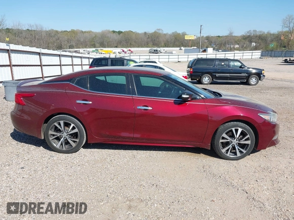 2016 Nissan Maxima Platinum z VIN 1N4AA6AP1GC416590, wystawiony jako IAAI lot #41817288 z przebiegiem 248 514 mil mil oraz . Historia ofert i sprzedaży dostępna na DreamBid. Obrazek 14.