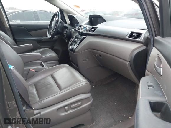 2012 Honda Odyssey EX-L with VIN 5FNRL5H6XCB032366, listed as a IAAI auction lot 41943625 with 73,236 mi miles and . Bid and sale history available at carsss.com. Image 5.