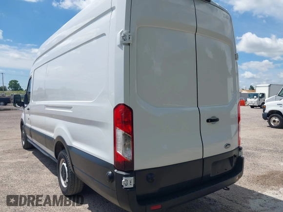 2022 Ford Transit Cargo with VIN 1FTBR3X89NKA23915, listed as a IAAI auction lot 42233534 with 3,755 mi miles and . Bid and sale history available at DreamBid. Image 3.