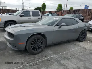 2017 Dodge Challenger R/T with VIN 2C3CDZBT4HH560533, listed as a Copart auction lot 55701585 with 111,648 mi miles and Salvage title. Bid and sale history available at DreamBid. Image 1.