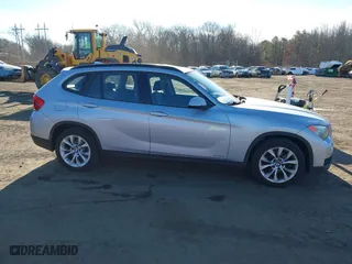 2013 BMW X1 xDrive28i with VIN WBAVL1C57DVR84747, listed as a IAAI auction lot 41273794 with 93,738 mi miles. Bid and sale history available at carsss.com. Image 13.