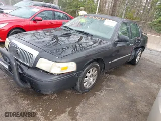 2004 Mercury Grand Marquis LS Premium with VIN 2MEFM75W04X624715, listed as a IAAI auction lot 41934346 with 185,119 mi miles. Bid and sale history available at carsss.com. Image 17.