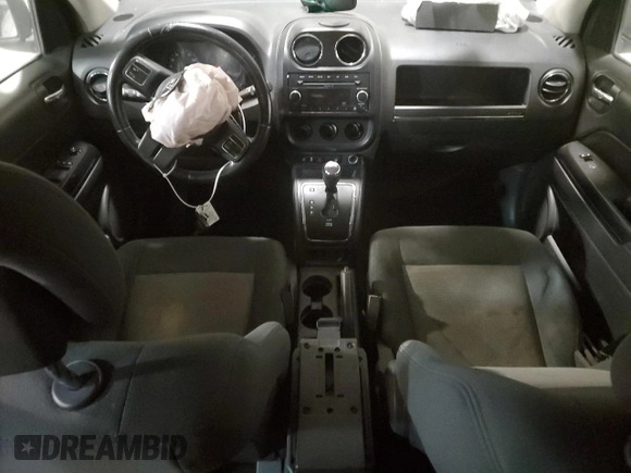2011 Jeep Compass with VIN 1J4NT1FB8BD192253, listed as a Copart auction lot 87692135 with 0 mi miles and Salvage Title. Bid and sale history available at carsss.com. Image 8.