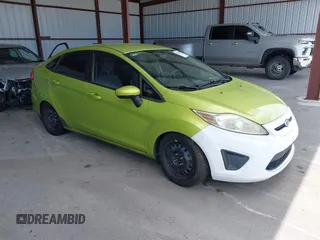 2012 Ford Fiesta SE z VIN 3FADP4BJ6CM160885, wystawiony jako IAAI lot #42502645 z przebiegiem 97 872 mil mil oraz . Historia ofert i sprzedaży dostępna na DreamBid. Obrazek 1.