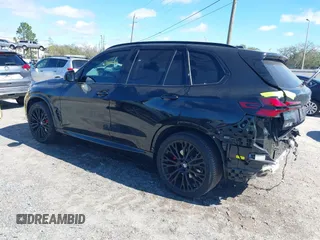 2025 BMW X5 sDrive40i with VIN 5UX13EU01S9W88784, listed as a IAAI auction lot 41631766 with 12,805 mi miles. Bid and sale history available at carsss.com. Image 3.