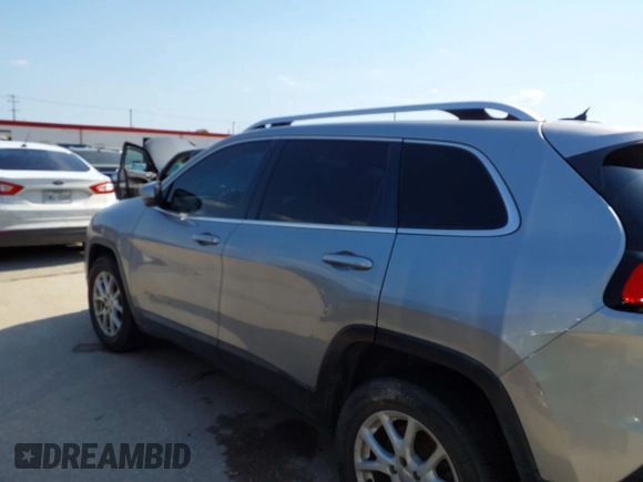 2014 Jeep Cherokee Latitude with VIN 1C4PJMCB4EW315520, listed as a IAAI auction lot 42034989 with 215,758 mi miles and . Bid and sale history available at DreamBid. Image 14.