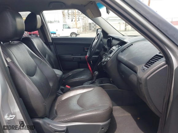 2011 Kia Soul + with VIN KNDJT2A22B7706579, listed as a IAAI auction lot 41921442 with 162,383 mi miles. Bid and sale history available at carsss.com. Image 5.