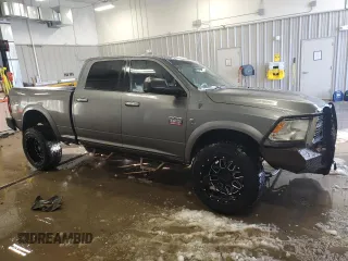 2012 Ram 2500 Laramie with VIN 3C6UD5FL1CG257194, listed as a Copart auction lot 41865975 with 341,556 mi miles and Clean Title. Bid and sale history available at carsss.com. Image 4.