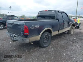 2000 Ford F-150 XL with VIN 1FTRX18L1YNA08999, listed as a IAAI auction lot 41988747 with 214,201 mi miles. Bid and sale history available at carsss.com. Image 4.