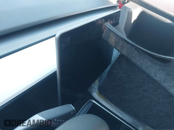 2023 Tesla Model 3 with VIN 5YJ3E1EA9PF695547, listed as a IAAI auction lot 40100334 with Not Provided miles and . Bid and sale history available at DreamBid. Image 18.