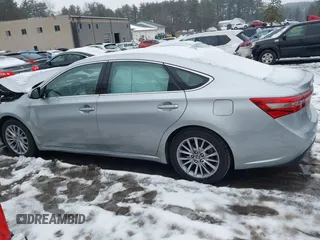 2016 Toyota Avalon XLE Premium z VIN 4T1BD1EB0GU049999, wystawiony jako IAAI lot #41624589 z przebiegiem 61 785 mil mil oraz . Historia ofert i sprzedaży dostępna na DreamBid. Obrazek 13.