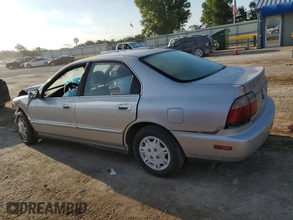 1997 Honda Accord Value with VIN 1HGCD5684VA168495, listed as a Copart auction lot 71716984 with 202,854 mi miles and Salvage Title. Bid and sale history available at DreamBid. Image 2.