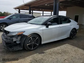 2019 Toyota Camry XSE with VIN 4T1B61HK1KU277900, listed as a Copart auction lot 50334865 with 122,154 mi miles and Salvage Title. Bid and sale history available at carsss.com. Image 1.