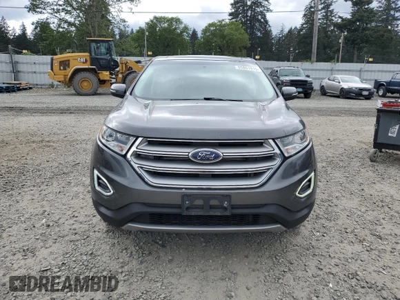2015 Ford Edge Titanium z VIN 2FMTK4K84FBB09582, wystawiony jako Copart lot #55801915 z przebiegiem 72 533 mil mil oraz Szkoda całkowita • Salvage title. Historia ofert i sprzedaży dostępna na DreamBid. Obrazek 5.