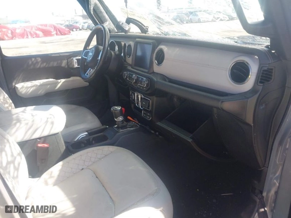 2022 Jeep Wrangler Unlimited Sahara with VIN 1C4HJXENXNW138856, listed as a IAAI auction lot 41670191 with 56,231 mi miles. Bid and sale history available at carsss.com. Image 5.