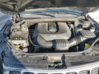 2015 Jeep Grand Cherokee Altitude with VIN 1C4RJFAG0FC136039, listed as a Copart auction lot 89237525 with 124,374 mi miles and Salvage Title. Bid and sale history available at carsss.com. Image 12.