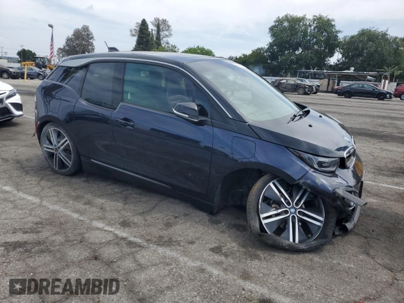 2018 BMW i3 with VIN WBY7Z4C52JVD95923, listed as a Copart auction lot 56426935 with Not provided miles and Salvage title. Bid and sale history available at DreamBid. Image 4.