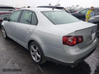 2009 Volkswagen Jetta Sedan S with VIN 3VWJZ71K29M148712, listed as a IAAI auction lot 41724523 with 112,043 mi miles. Bid and sale history available at carsss.com. Image 3.