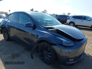 2023 Tesla Model Y Performance with VIN 7SAYGDEF5PF823122, listed as a IAAI auction lot 41546480 with 12,943 mi miles and . Bid and sale history available at DreamBid. Image 1.