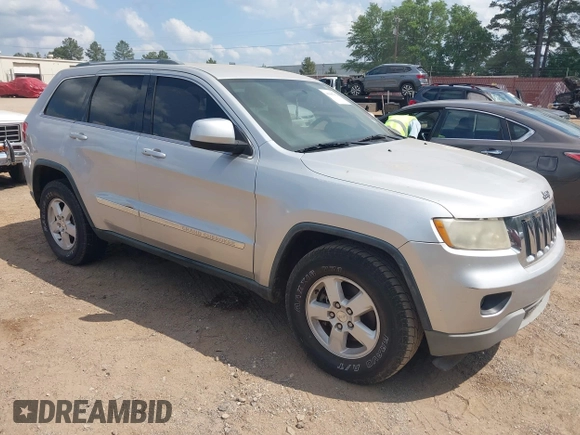 2012 Jeep Grand Cherokee Laredo with VIN 1C4RJEAG4CC251359, listed as a IAAI auction lot 41986762 with 172,331 mi miles. Bid and sale history available at carsss.com. Image 1.