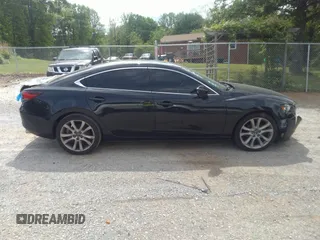 2015 Mazda 6 i Grand Touring with VIN JM1GJ1W68F1168078, listed as a IAAI auction lot 42149519 with 127,641 mi miles and . Bid and sale history available at DreamBid. Image 13.