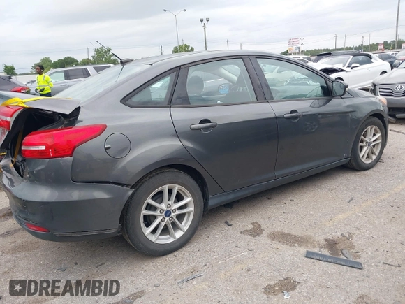 2017 Ford Focus SE z VIN 1FADP3F23HL325751, wystawiony jako IAAI lot #42182722 z przebiegiem 46 119 mil mil oraz . Historia ofert i sprzedaży dostępna na DreamBid. Obrazek 4.