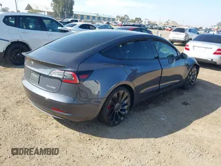 2022 Tesla Model 3 Performance with VIN 5YJ3E1ECXNF264830, listed as a IAAI auction lot 41625494 with Not Provided miles and . Bid and sale history available at carsss.com. Image 4.