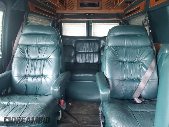 1999 Ford Econoline Cargo Recreational with VIN 1FDRE14L3XHA31771, listed as a Copart auction lot 49973795 with 220,268 mi miles and Salvage title. Bid and sale history available at DreamBid. Image 10.