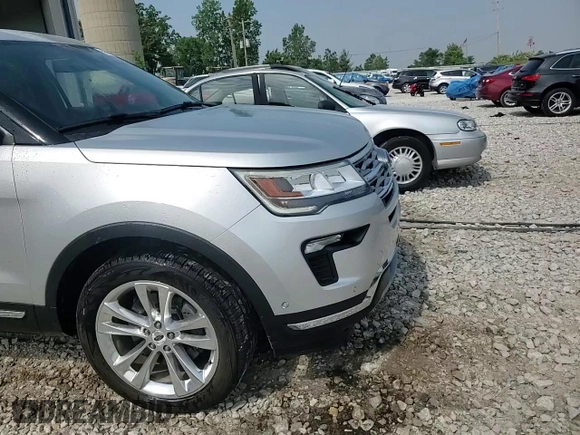 2018 Ford Explorer Limited z VIN 1FM5K8F83JGB29334, wystawiony jako Copart lot #59515225 z przebiegiem 132 040 mil mil oraz Czysty tytuł • Clean title. Historia ofert i sprzedaży dostępna na DreamBid. Obrazek 14.