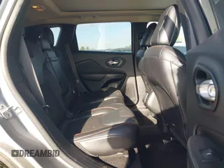 2015 Jeep Cherokee Trailhawk with VIN 1C4PJMBS3FW662307, listed as a IAAI auction lot 41778932 with 64,569 mi miles. Bid and sale history available at carsss.com. Image 8.