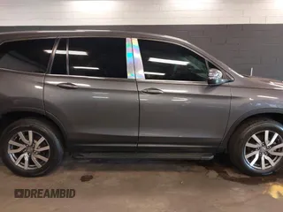 2022 Honda Pilot EX-L with VIN 5FNYF6H59NB000754, listed as a IAAI auction lot 42090576 with 32,813 mi miles and . Bid and sale history available at DreamBid. Image 13.