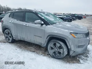 2019 Jeep Compass Latitude with VIN 3C4NJDBB5KT657245, listed as a IAAI auction lot 41403429 with 80,296 mi miles. Bid and sale history available at carsss.com. Image 1.